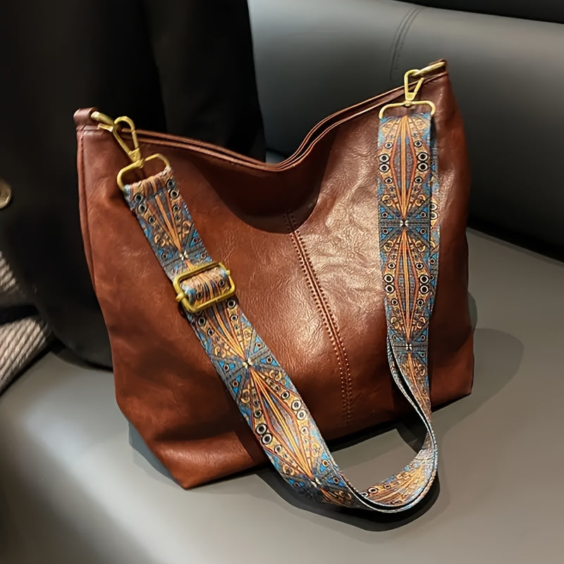 The Sienna Bag in brown, strap detail